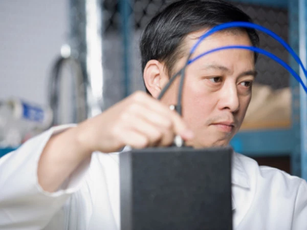 man testing computer